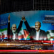 A banner with Hamas leader Ismail Haniyeh and Iranian President Masoud Pezeshkian holding hands