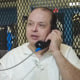 Robert Roberson speaks on the phone in jail