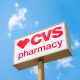 The CVS pharmacy logo is seen outside of a storefront 