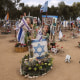 On the eve of the first anniversary of the Oct. 7 terrorist attacks, an Israeli soldier visits an installation honoring those killed and kidnapped at the Supernova music festival near Kibbutz Reim in southern Israel.