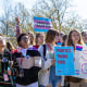 Teens with banners.