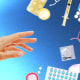 An assortment of contraceptives (condoms, birth control pills, syringes, IUDs) lay scattered around the right edge of the image. From the left, a hand reaches towards the right, as if grasping for the contraceptives.