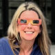 Suzanne Simpson wearing eclipse glasses.