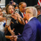 Donald Trump greets people following a roundtable discussion at the Latino Summit.