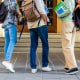 Image of unrecognizable group of students standing in university campus