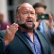 Alex Jones speaks to the media