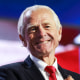 Peter Navarro smiles on stage