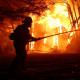 Image: Powerful Winds Fuel Multiple Fires Across Los Angeles Area silhouette firefighter eaton fire wildfire