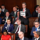 Rep. Andy Ogles, R-Tenn., holds a sign with the name of slain Georgia student Laken Riley as President Joe Biden delivers his State of the Union address 