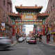 Evening traffic passes near the Chinatown neighborhood of Philadelphia.