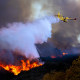 fire in palisades super scooper ocean water drop plane firefighting