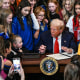 Image: President Donald Trump signs the No Men in Women's Sports Executive Order into law