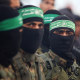  Hamas militants hand over three Israeli hostages on February 8, as part of the fifth exchange under a fragile Gaza ceasefire, with 183 prisoners held by Israel due to be released later in the day. 