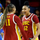 JuJu Watkins, right, and Kennedy Smith of the USC Trojans react during a game against the UCLA Bruins 