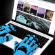 Photo Illustration: A robot, with its hands on a laptop, surfs a travel website