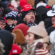 A crowd waits in line to get into Capital One Arena for Donald Trump's inauguration celebration on Jan. 20, 2025 in Washington.