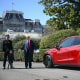 Image: President Donald Trump, alongside Tesla CEO Elon Musk, speaks next to a Tesla vehicle on the South Portico of the White House