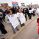 Internal Revenue Service employee Diane LeDesna, from Kansas City, Mo., leads protesters supporting federal workers outside the IRS regional office Saturday, March 15, 2025, in Kansas City, Mo. 