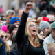 The crowd reacts at a "Fighting Oligarchy" rally; Ali Velshi 