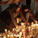 Mourners attend a candlelight vigil near the scene where a car drove into a crowd of people during the Lapu Lapu Festival on April 27, 2025 in Vancouver, Canada.  
