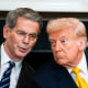 Scott Bessent, left, speaks with President Trump