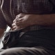 Person suffering from abdominal pain