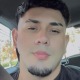 Daniel Orellana inside of a car