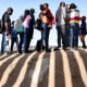 People wait in line outside
