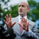 Stephen Miller speaks with reporters.