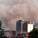 Smoke billows after an artillery shell landed in the main town of Poonch district in India's Jammu region; MSNBC's Ali Velshi