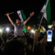 People celebrate in Damascus' Omeyyad square