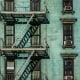 View of fire escape outside green New York apartment