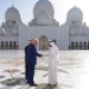 President Donald Trump shakes hands with with Yousif Al Obaidli