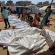 Covered bodies of Palestinians, who lost their lives after Israeli attacks, are brought to Indonesia Hospital in Gaza City