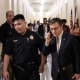 US House Speaker Mike Johnson arrives before a House Budget Committee meeting at the US Capitol