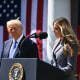 Image: President Donald Trump looks on as first lady Melania Trump speaks