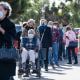 People wait in line to get the vaccine.