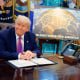 President Donald Trump and Defense Secretary Pete Hegseth in the Oval Office as they announce plans for a "Golden Dome" on May 20, 2025.
