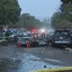 Damaged vehicles near the scene of a small plane crash in the Murphy Canyon neighborhood of San Diego.