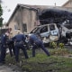 Authorities work the scene where a small plane crashed into a San Diego neighborhood on Thursday, May 22, 2025. 
