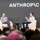 Anthropic CEO Dario Amodei, right, and Chief Product Officer Mike Krieger talk after unveiling Claude 4 during the Code with Claude conference on Thursday, May 22, 2025 in San Francisco.