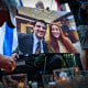 A photo of Yaron Lischinsky and Sarah Milgrim is displayed at a vigil outside the White House on May 22, 2025.