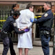 New York police officers arrest John Woeltz on May 23, 2025, in New York. 