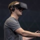 Mark Zuckerberg wears an Oculus Rift virtual reality headset in 2016.