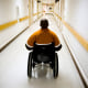 A veteran in a wheelchair in the hallway of the Veterans Affairs Medical Center in Washington