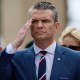 Defense Secretary Pete Hegseth salutes during a ceremony at the Normandy American Cemetery to mark the 81st anniversary of the D-Day landings on June 6, 2025 in Colleville-sur-Mer, France. 