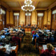 Georgia's State Election Board members discuss proposals to a full room for election rule changes at the state capitol on Sept. 20, 2024, in Atlanta.