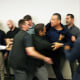 Sen. Alex Padilla, D-Calif., is pushed out of the room