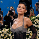 Kylie Jenner posing as she arrives at the Met Gala