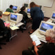 People use computers in a computer lab